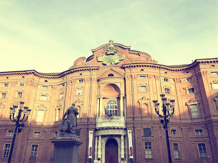 The historic Baroque architecture of Palazzo Carignano in Turin, Italy captured during the day.